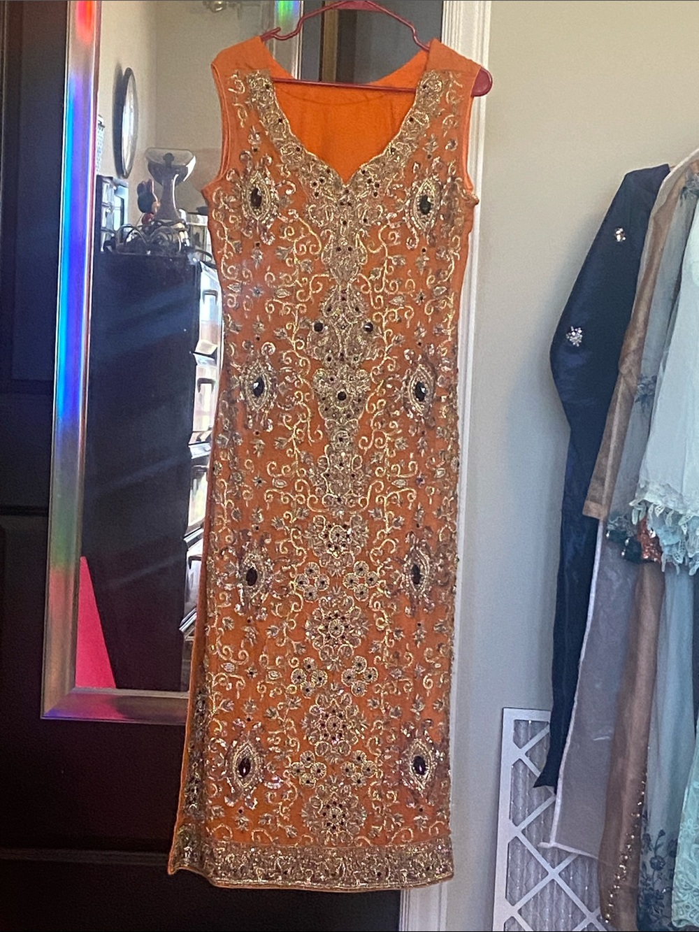 Embroidered Orange Sleeveless Women's Kurta with inner long sleeves option